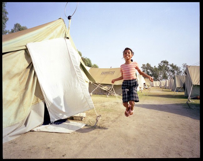  Palestinian girl skips rope at UNHCR camp in Baghdad. June, 2003.&nbsp;   