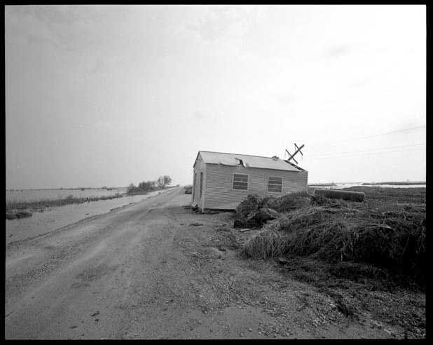  House pushed across a road by storm surge in Cameron Parish Louisiana, September 27, 2005.   