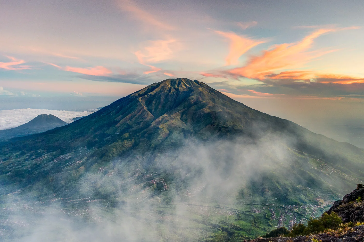 Mount Merbabu at sunrise; the starting point Selo can be seen on the bottom right
