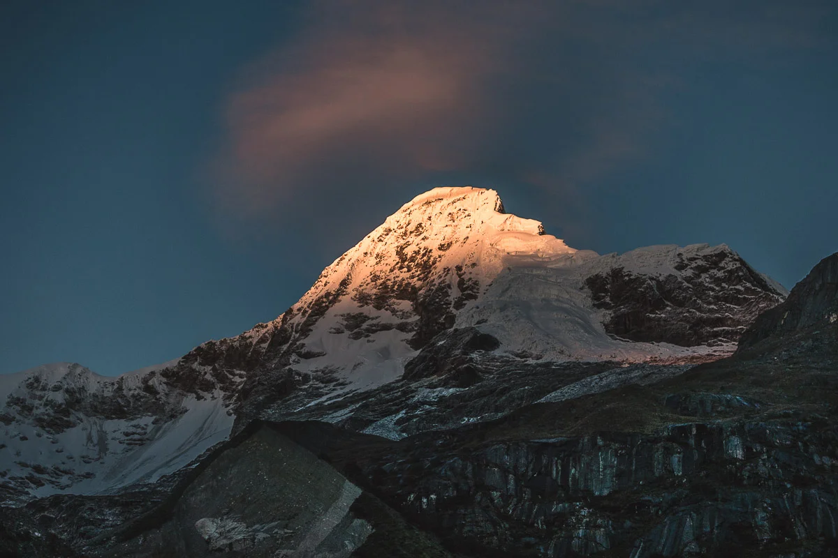 Alpenglow on Artesonraju – clouds immediately start to form around the summit.