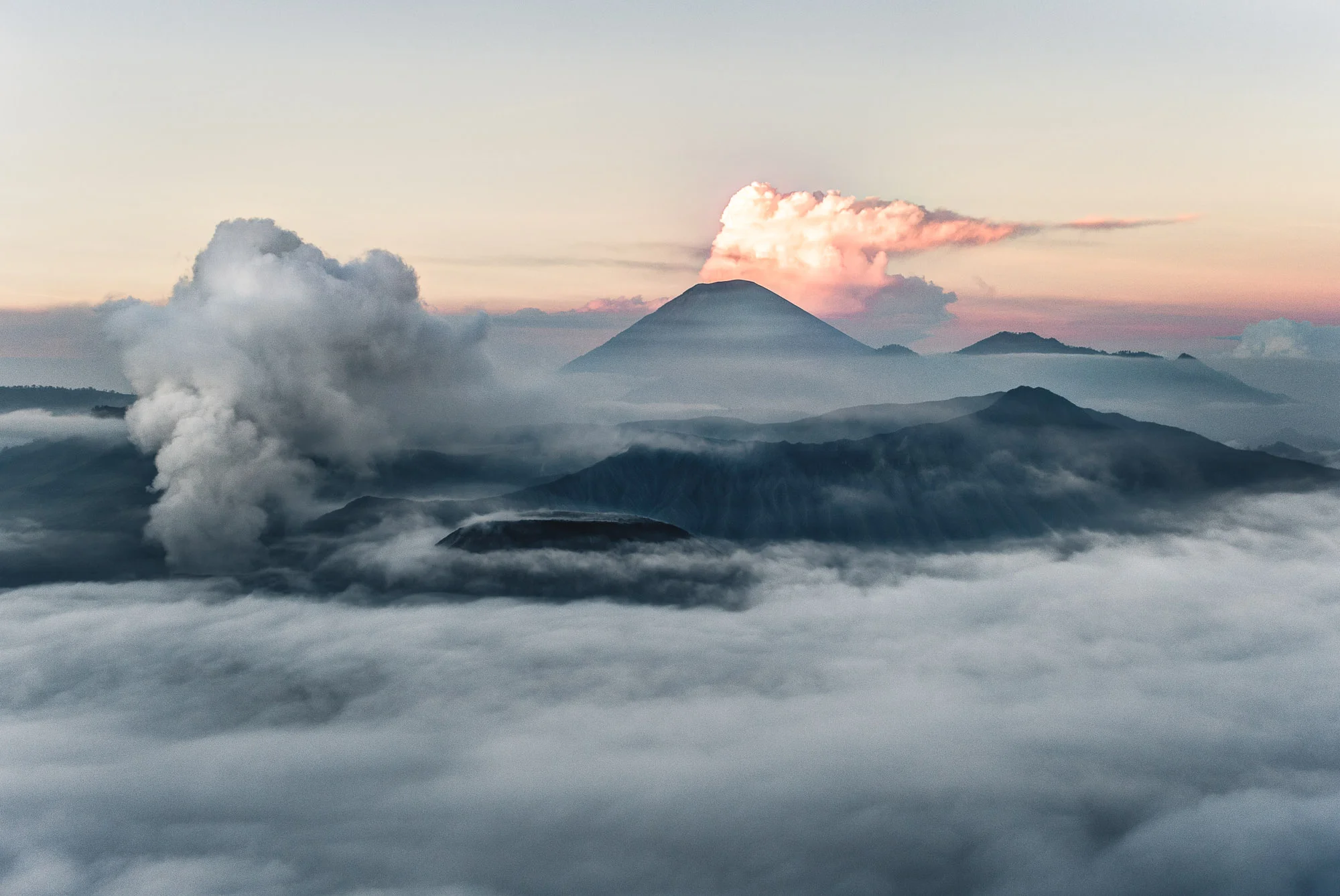 Mount Bromo and Semeru seen from the crater rim, Indonesia