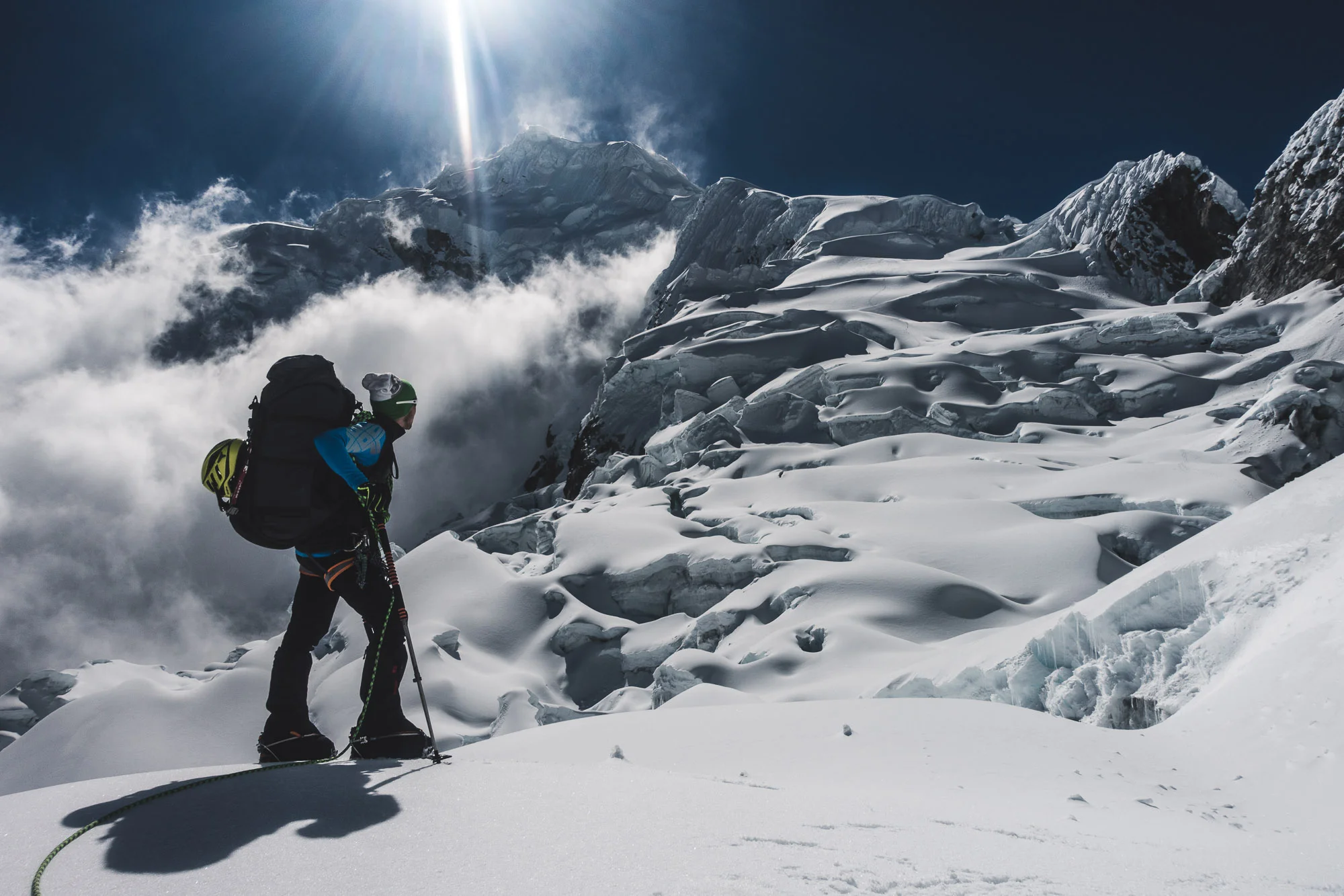 Assessing the route ahead on Chopicalqui (6345m), Cordillera Blanca, Peru