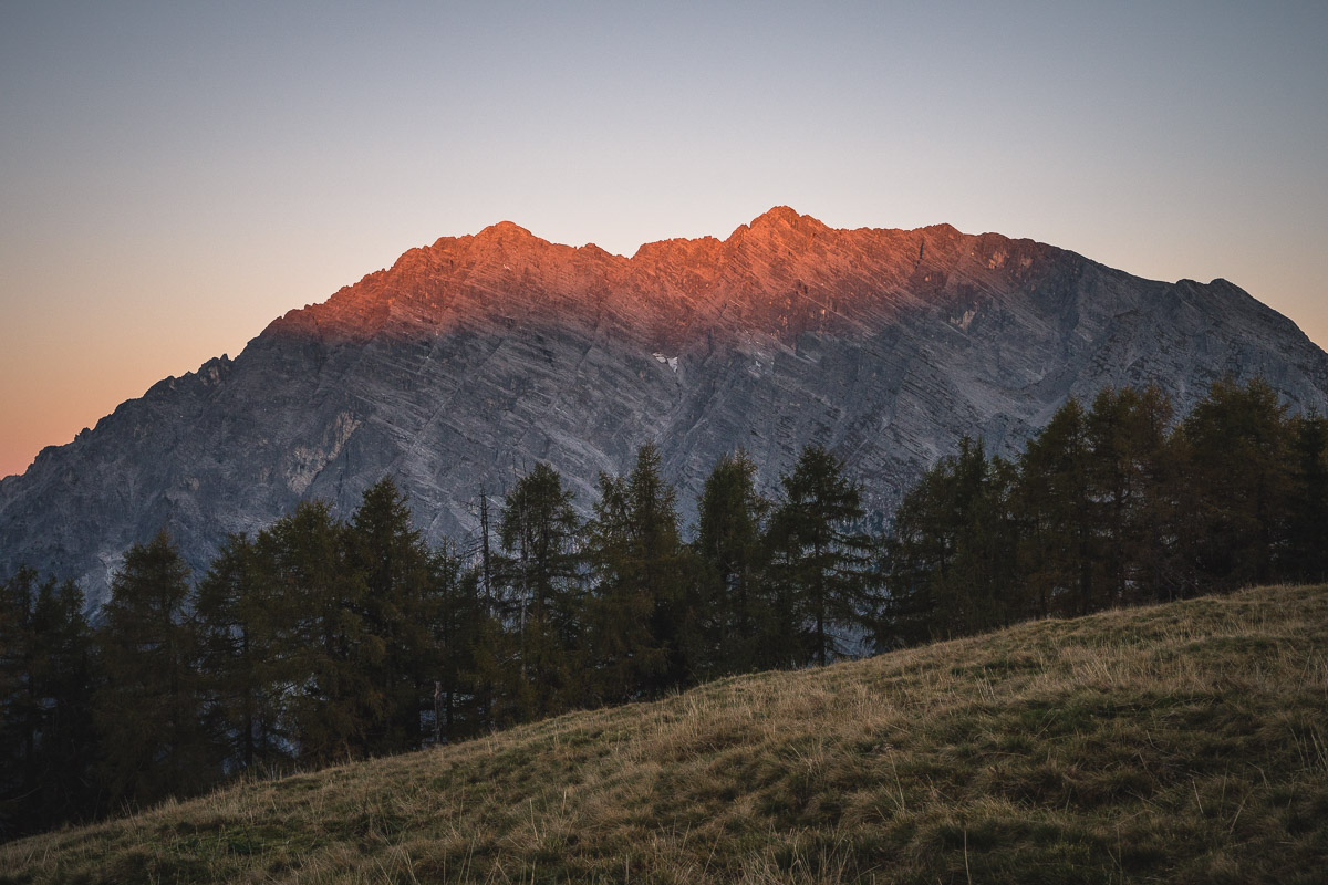 The Watzmann east face catches the first sunrays
