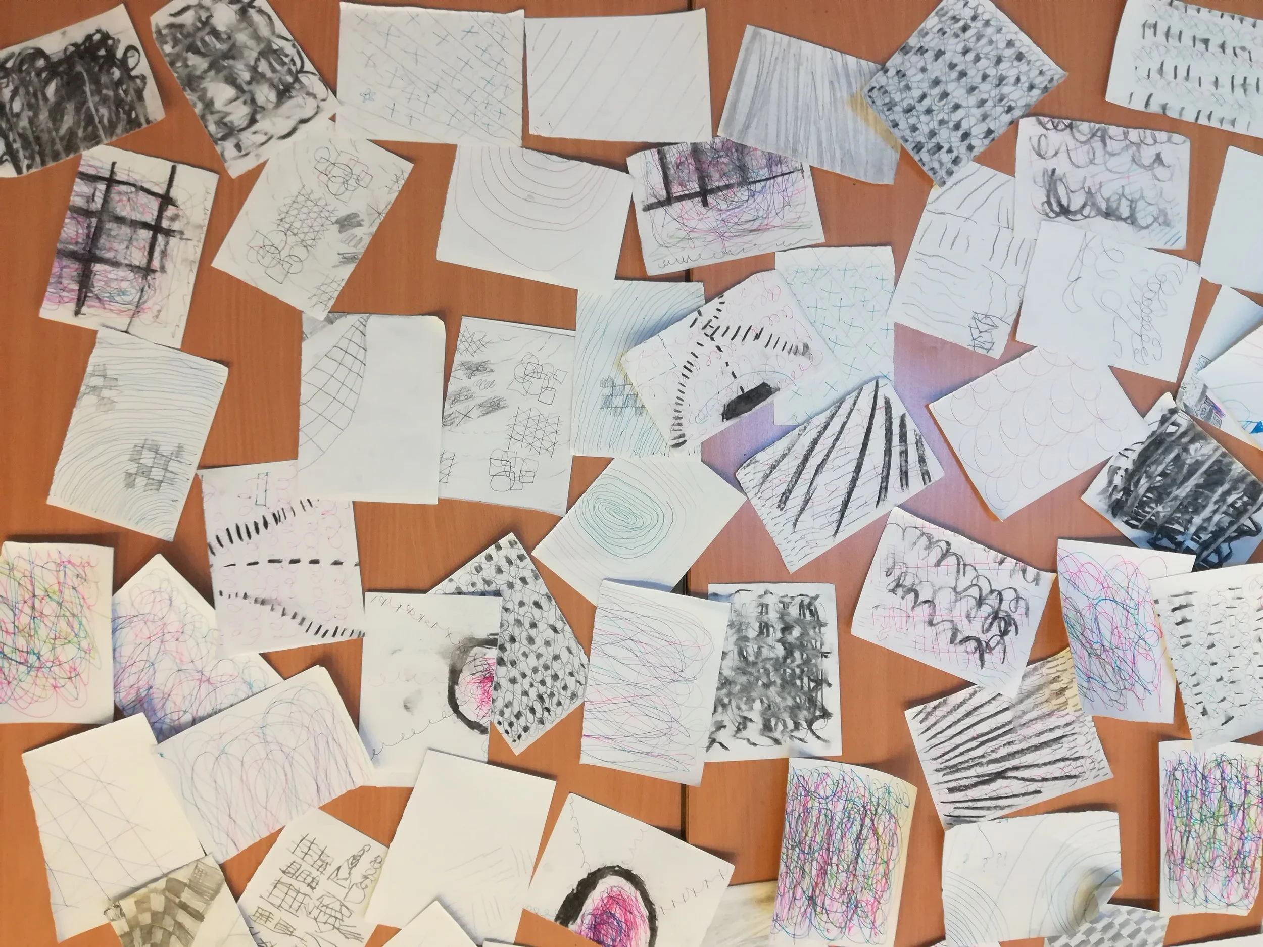 Mark making with dry materials.