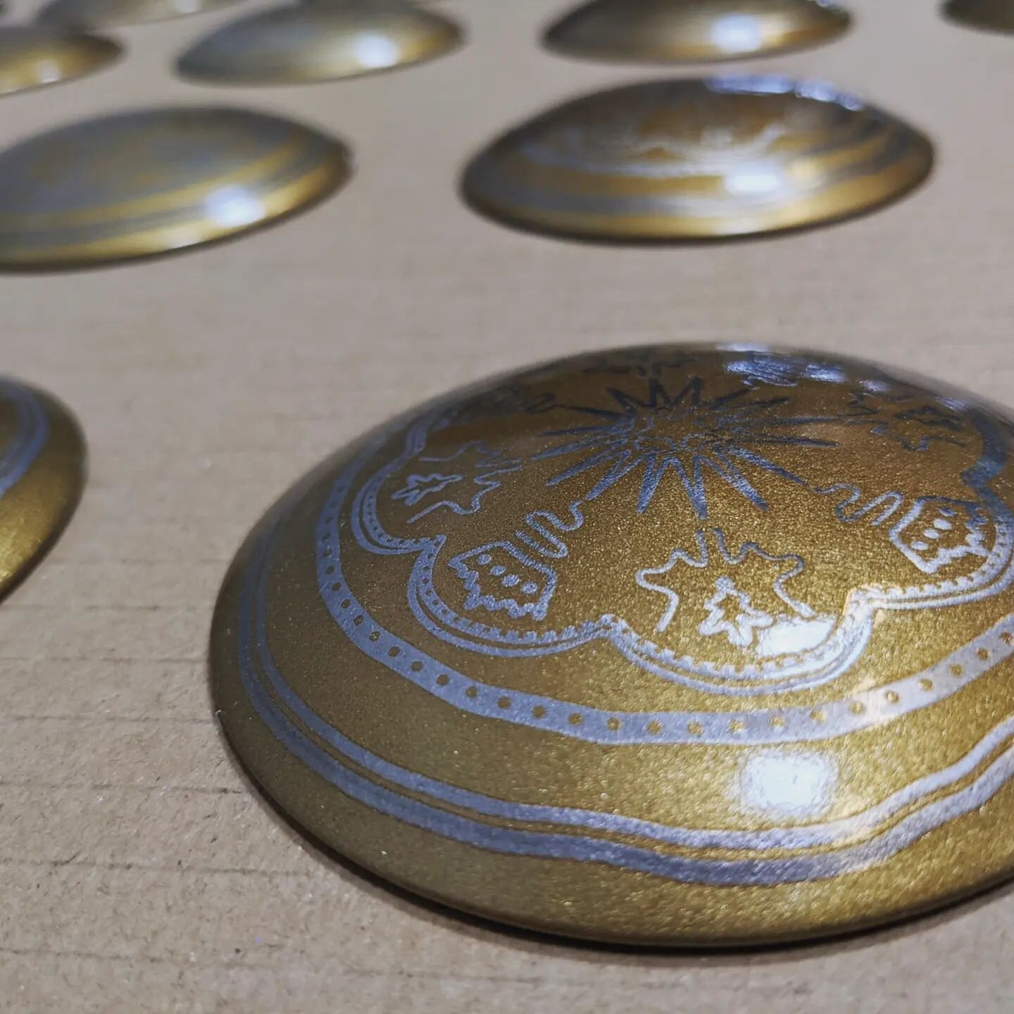 Road studs in the shape of the iconic rosenobel coins produced for @helsingorkommune
