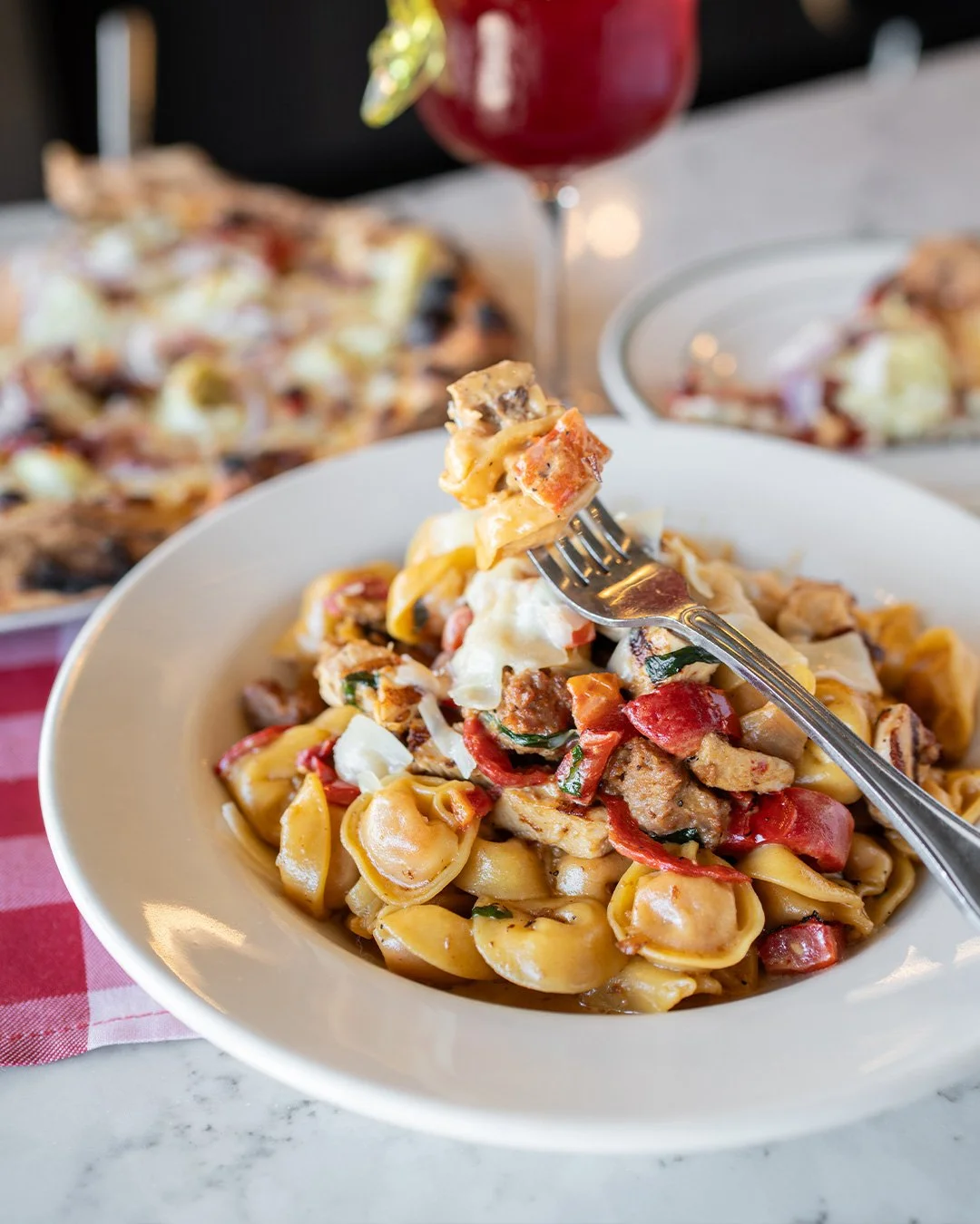 Specials? For the weekend? Groundbreaking.

THAT IS ALL
Calabrian Chili Tortellini, Crumbled Italian Sausage, Grilled Chicken, Roasted Red Peppers, Caramelized Onions, Basil, Red Pepper Flake in a Sweet Cream Sauce

THE BOOK
Garlic-Rosemary Parmesan 