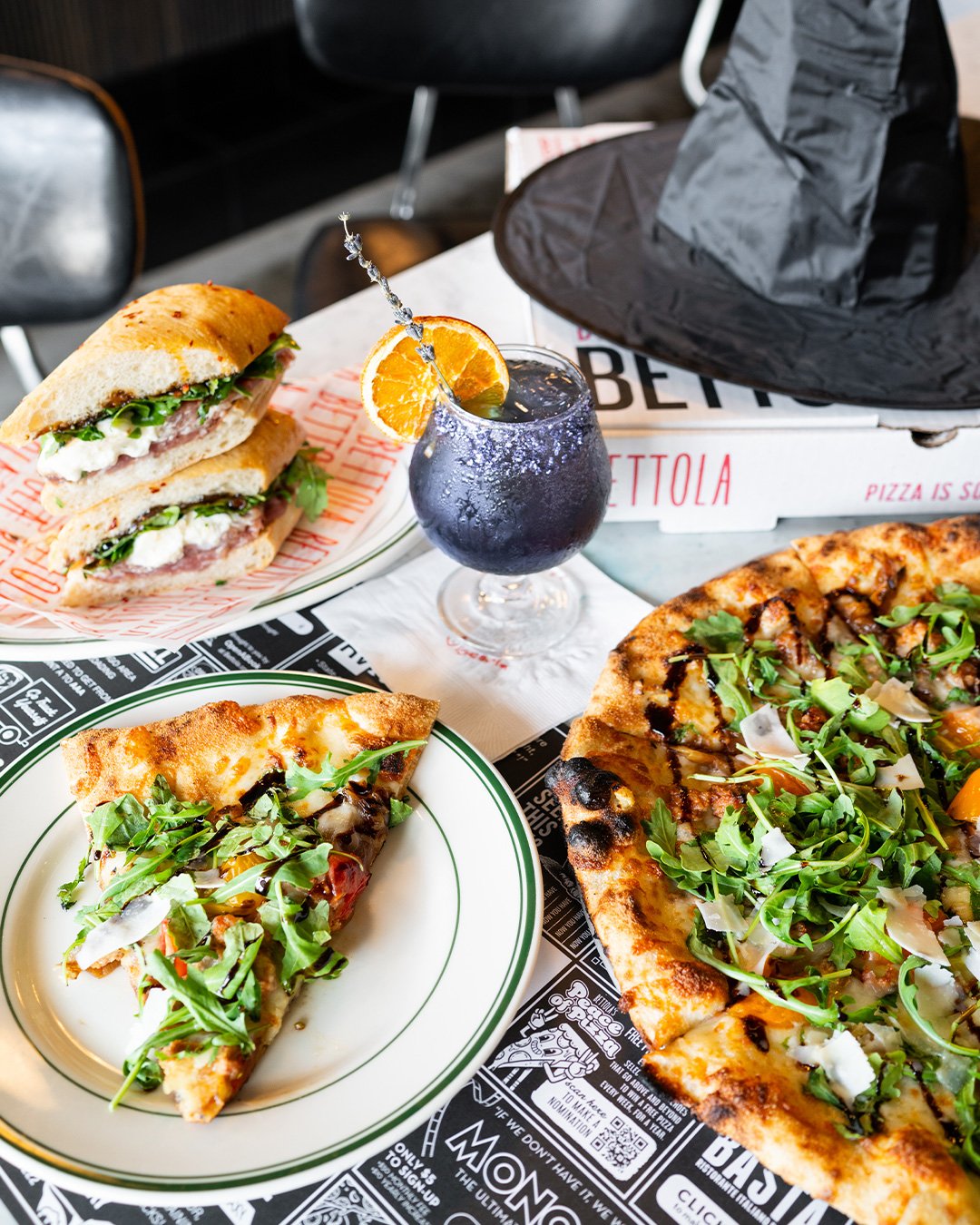 We're bewitched by these Practical Magic specials

SPELLBOUND
Garlic Oil Base, Fresh &amp; Shredded Mozzarella, Crumbled Italian Sausage, Caramelized Onions, Heirloom Cherry Tomatoes finished with Arugula, Shaved Pecorino, Balsamic Glaze.

BELLADONNA