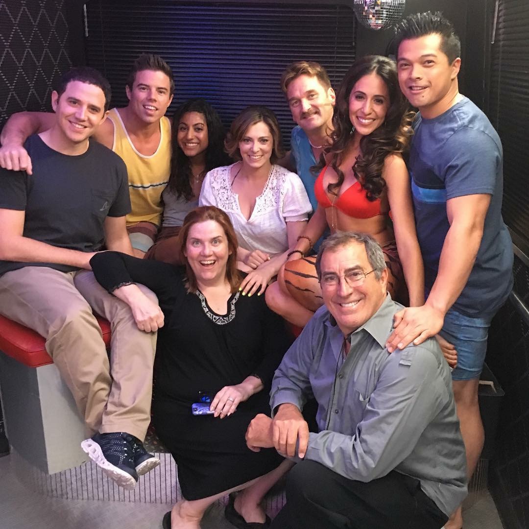 CAST OF CRAZY-EX GIRLFRIEND POSING WITH DIRECTOR KENNY ORTEGA