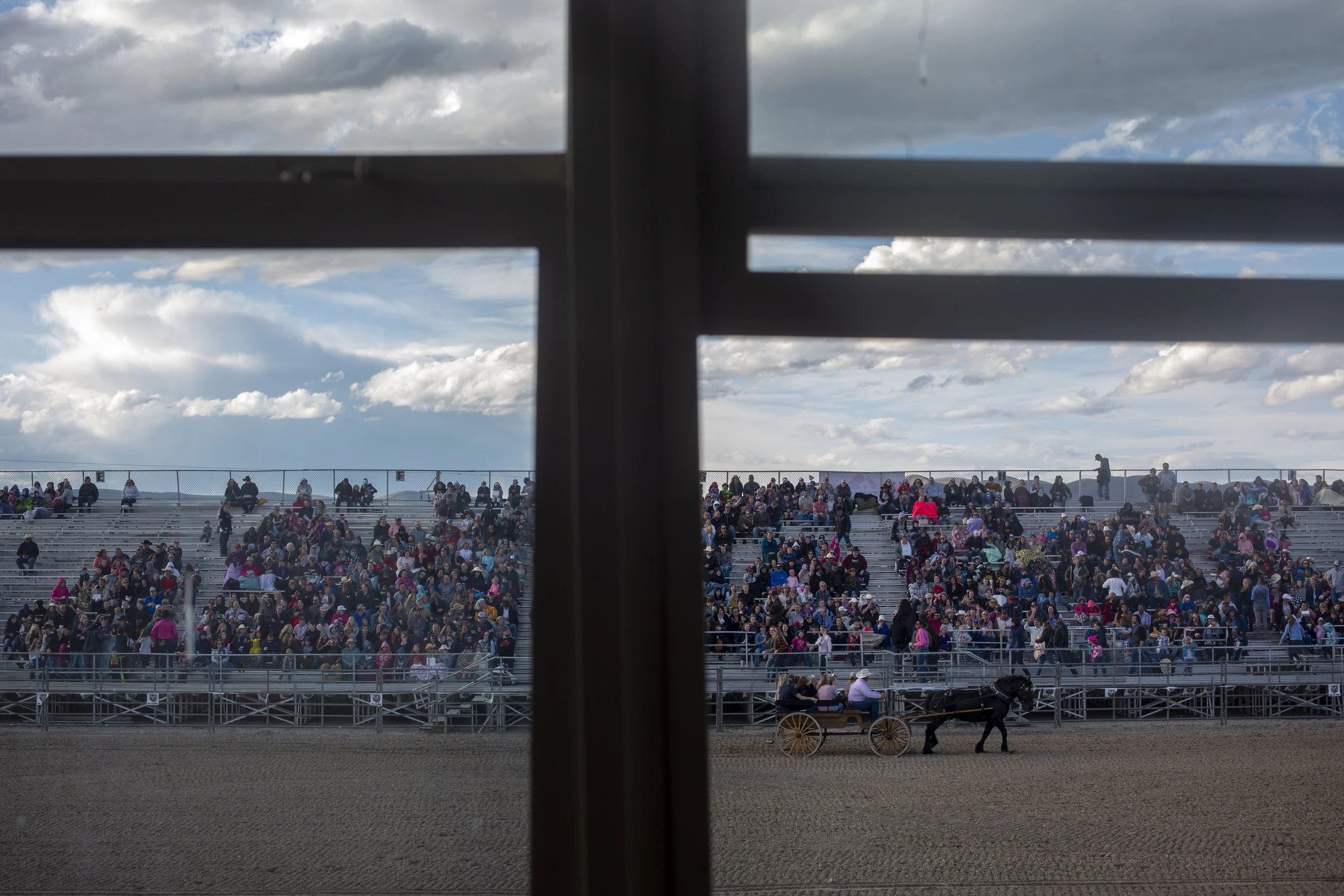 A horse and carriage passes through the arena at the Pony Express Rodeo Saturday, May 25, 2019 at Eagle Mountain, Utah.