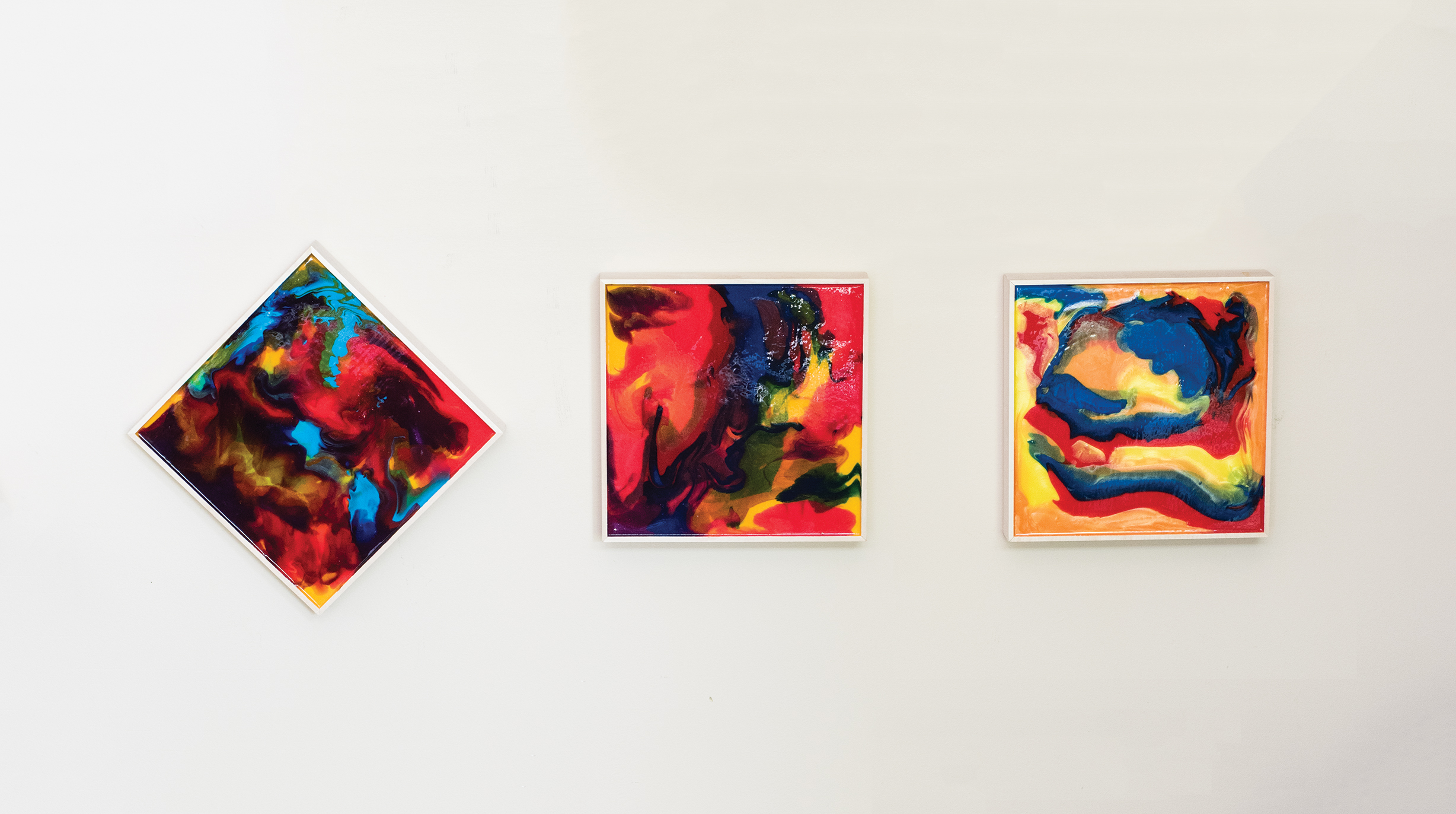 Glen Walton’s artwork hangs on his living room wall.