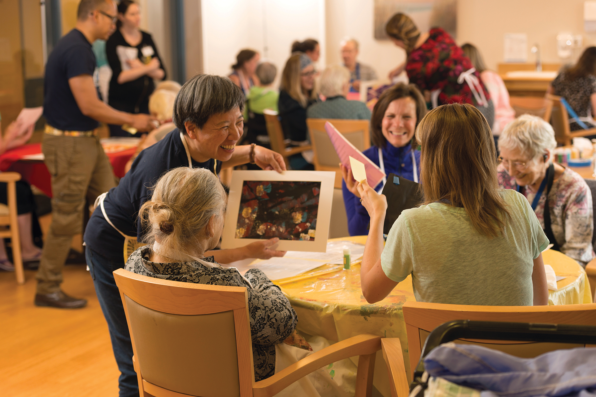 Elizabeth Lokon leads participants in the OMA program at Bow View Manor.