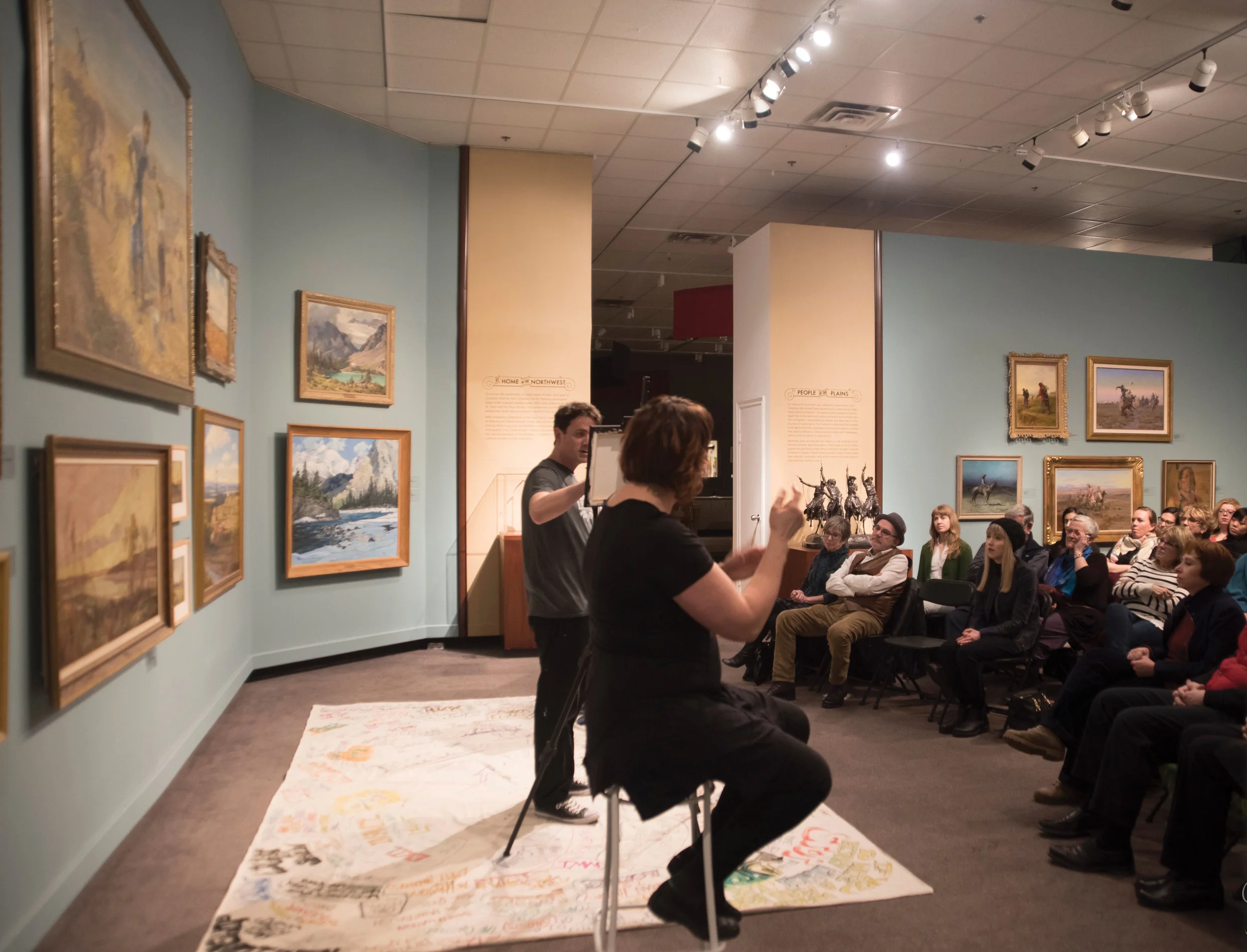 Bruce Horak performs his play Assassinating Thomson as his words are intepreted into American Sign Language—another way of making live theatre accessible to everyone.