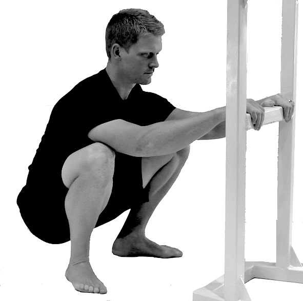 Hold a squat for 1 minute everyday to reduce back pain
