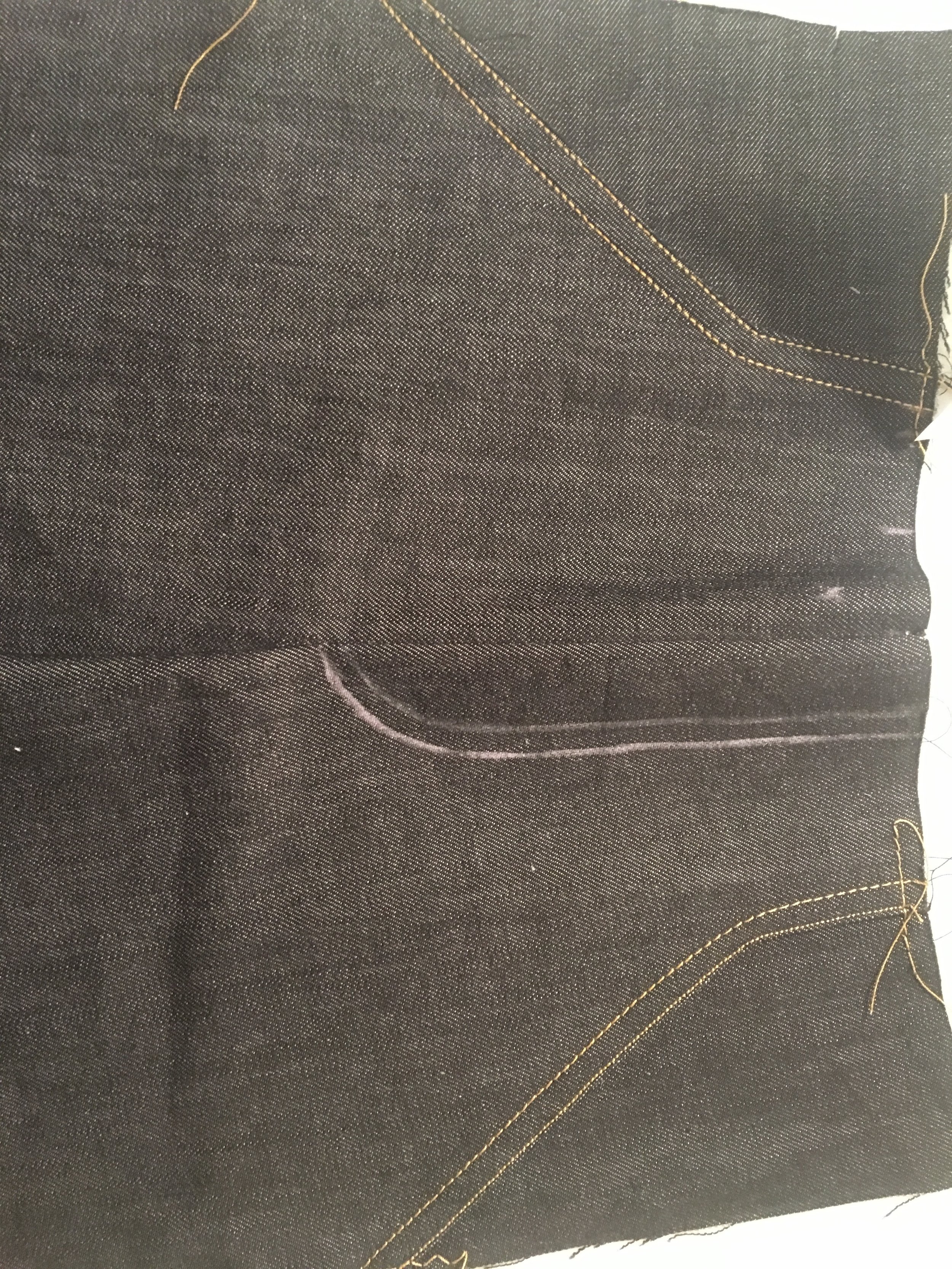 assembled pants front, chalked for fly topstitching guides