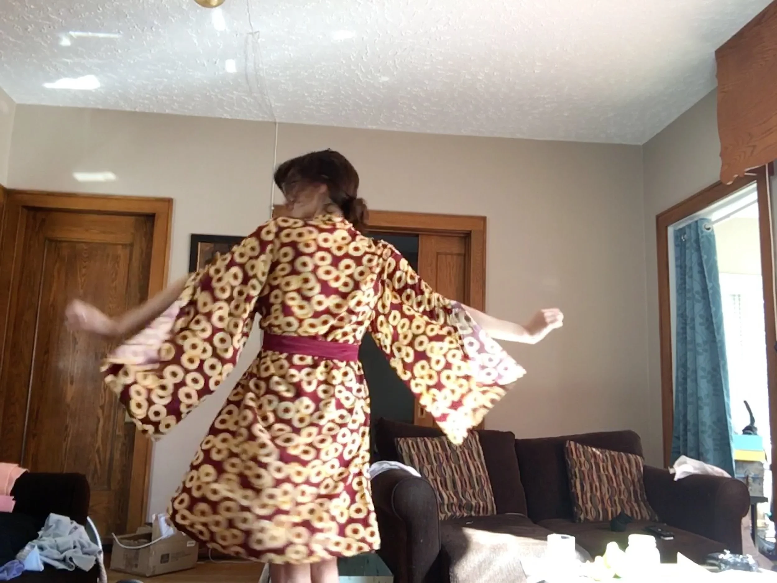 Victoria twirling in robe
