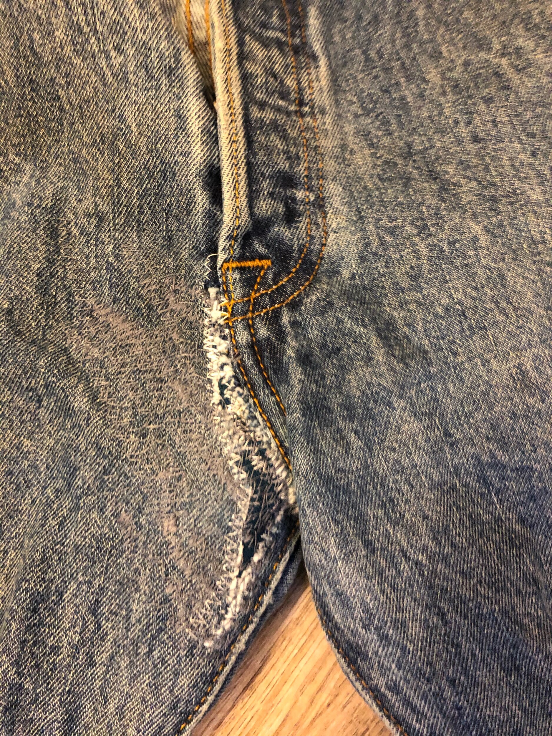 closeup of jeans mend