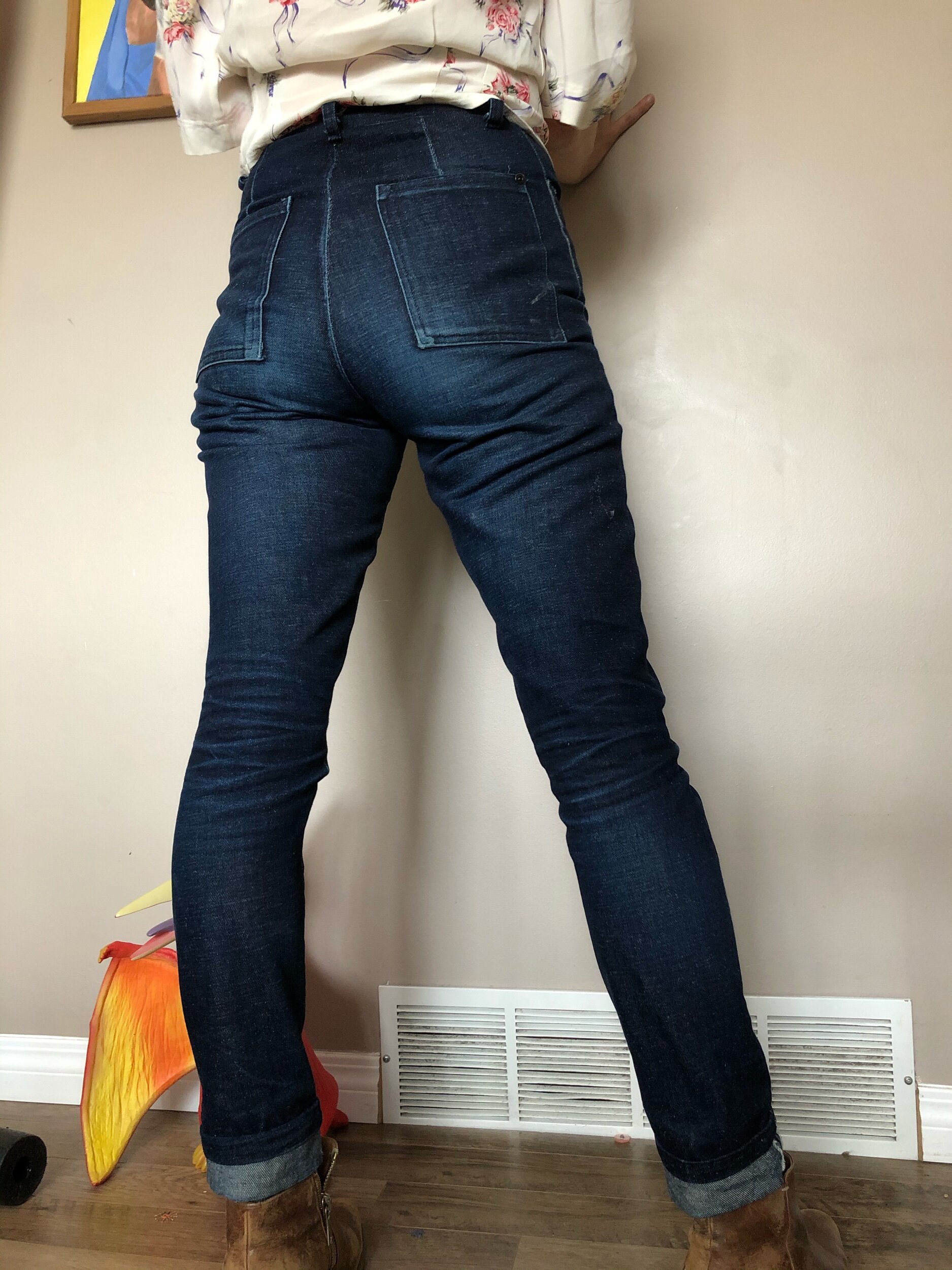 rear view of aged raw denim philipa pants jeans in popcorn denim