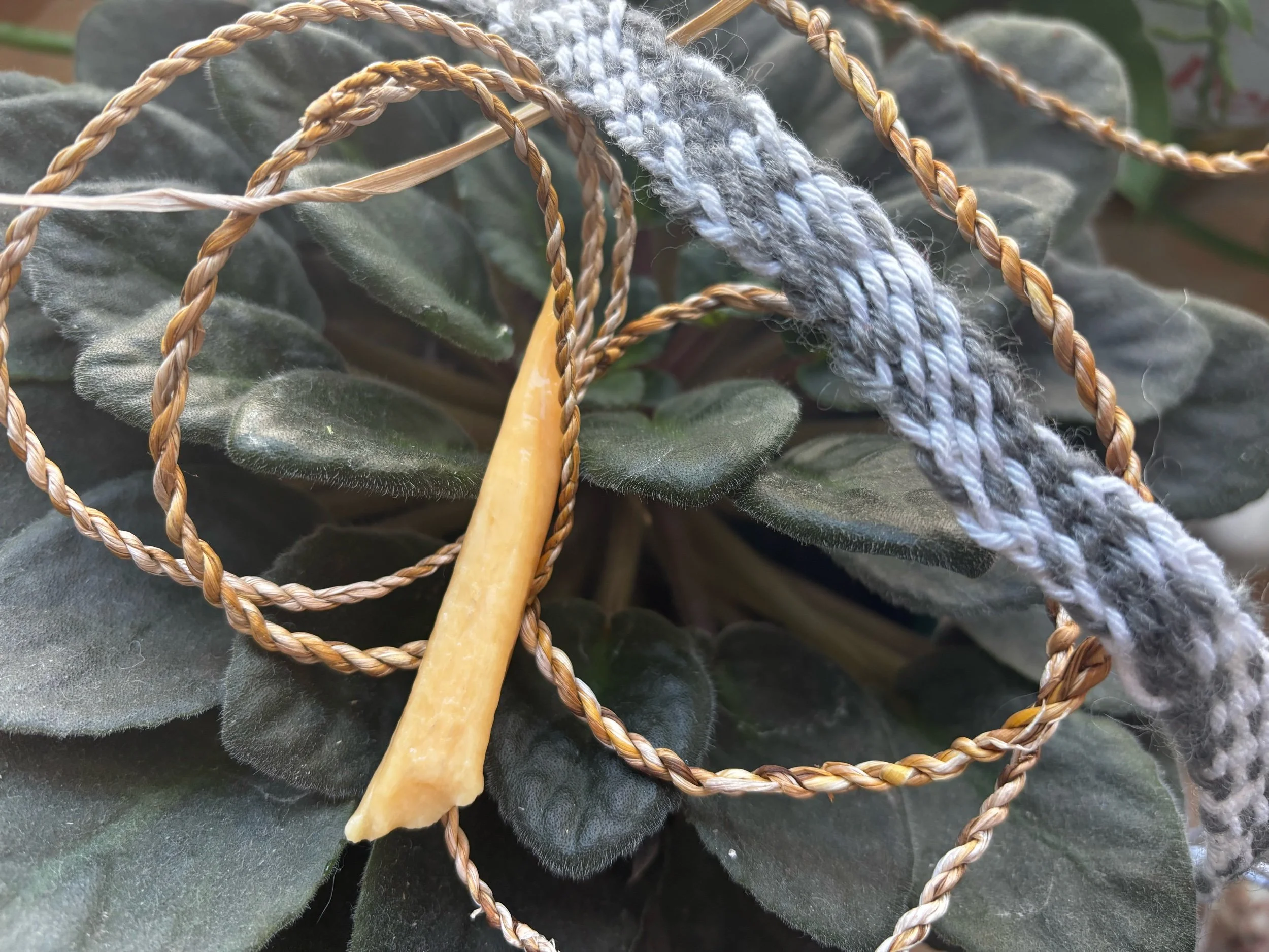 Prehistoric textiles: bone awl, daylily string, fingerweaving