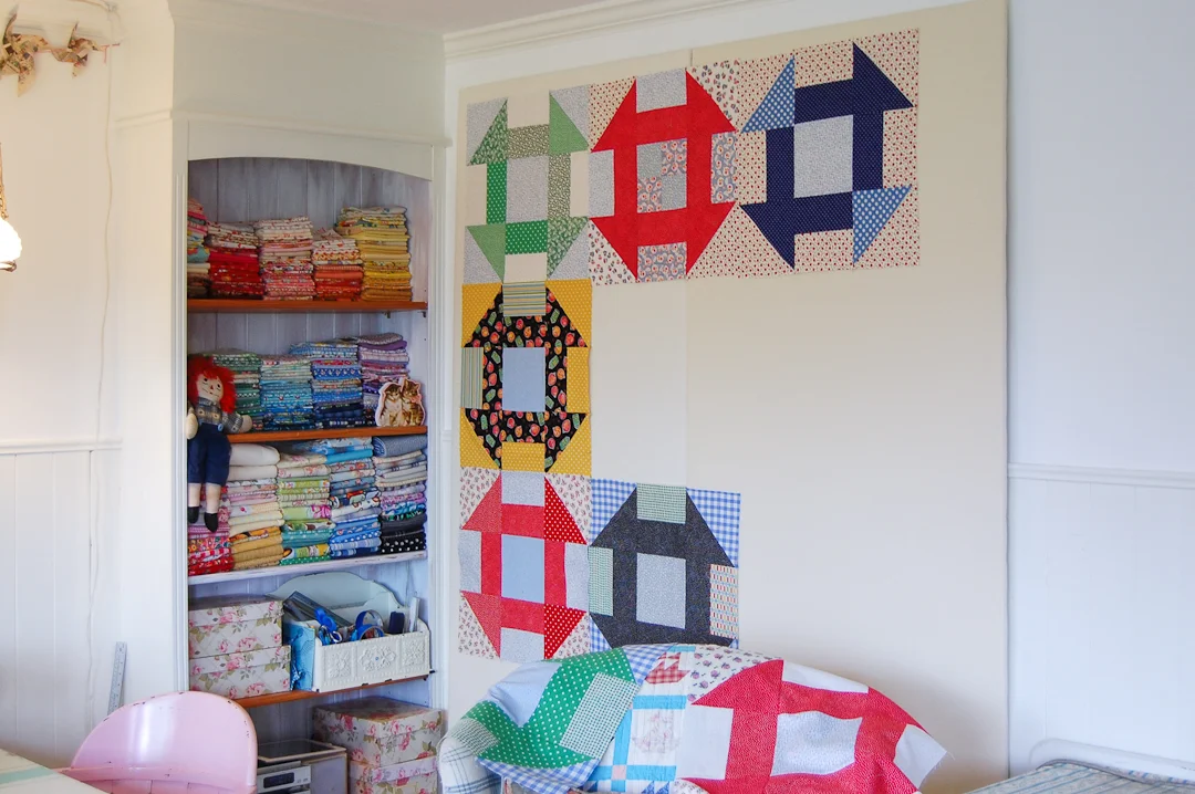 Primary Colors Supersize Churn Dash Quilt Assembly via www.helloquilting.com