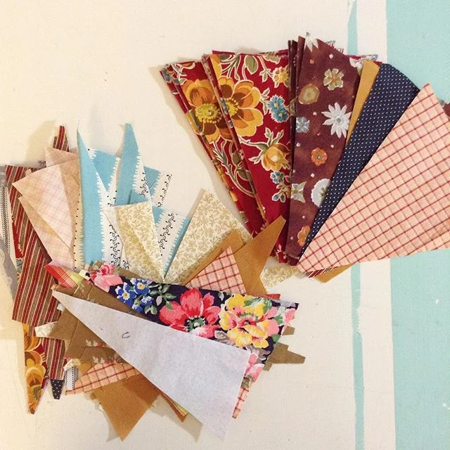 Leftover Triangles from the Prairie Starscope Quilt via www.helloquilting.com