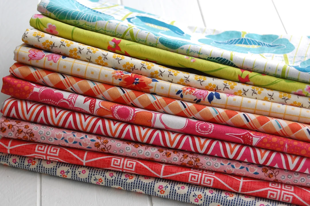 Summer Brights Churn Dash Quilt Fabric Pull via www.helloquilting.com