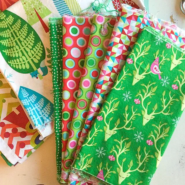 Scrappy Christmas Triangles Quilt Fabric Pull via www.helloquilting.com