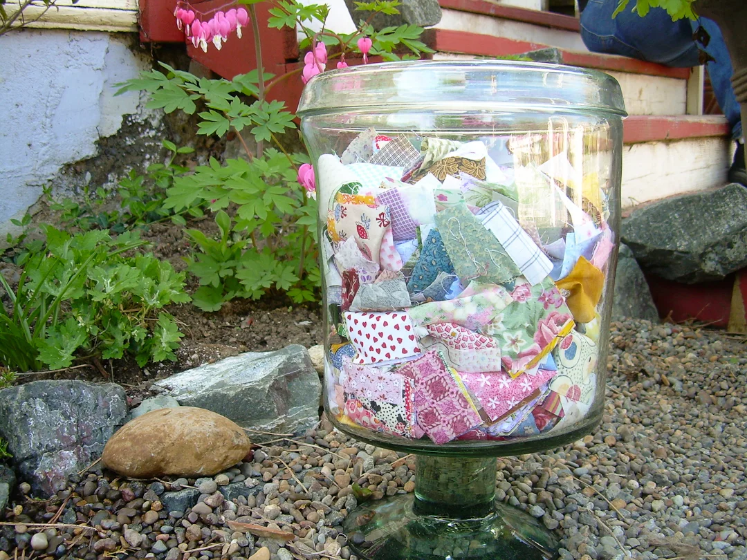 Jar of Two Inch Square Scraps via www.helloquilting.com