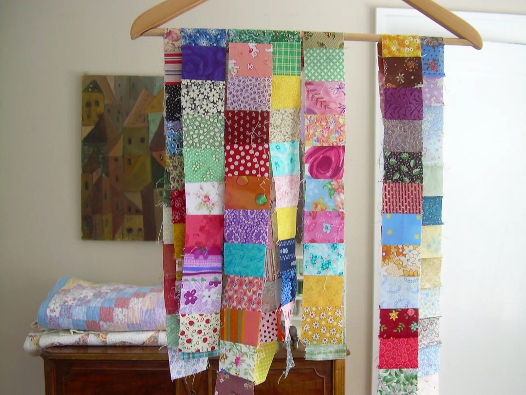Strings of Leader-Ender Two Inch Squares via www.helloquilting.com