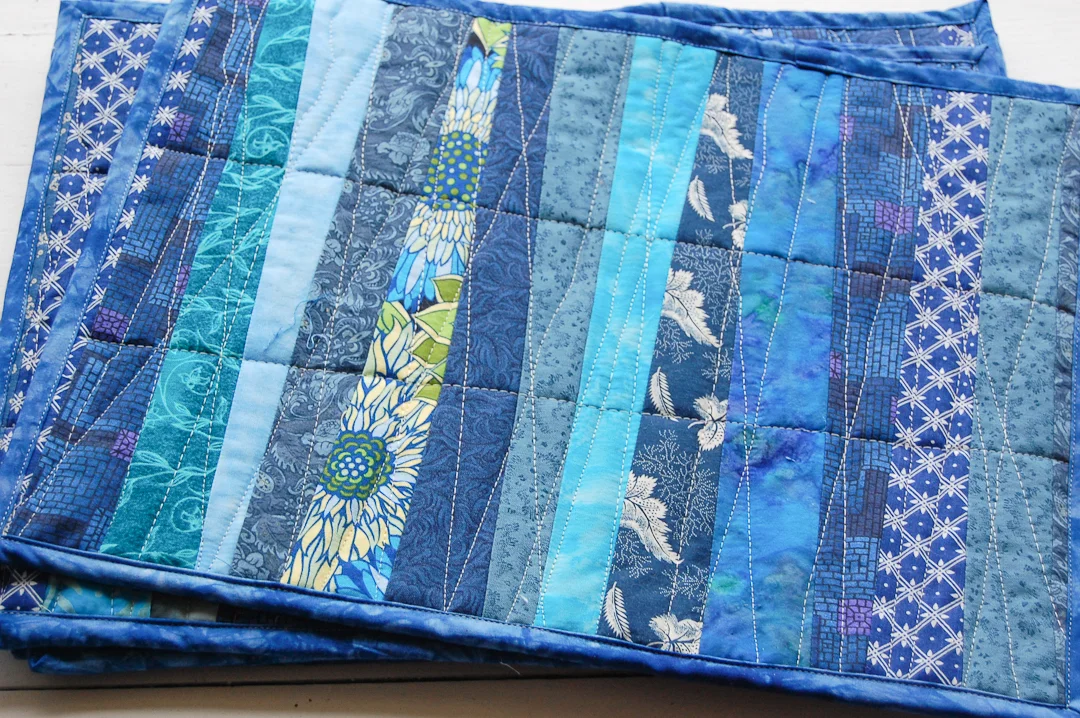 Scrapbuster Stripes Quilted Placemats Finished via www.helloquilting.com