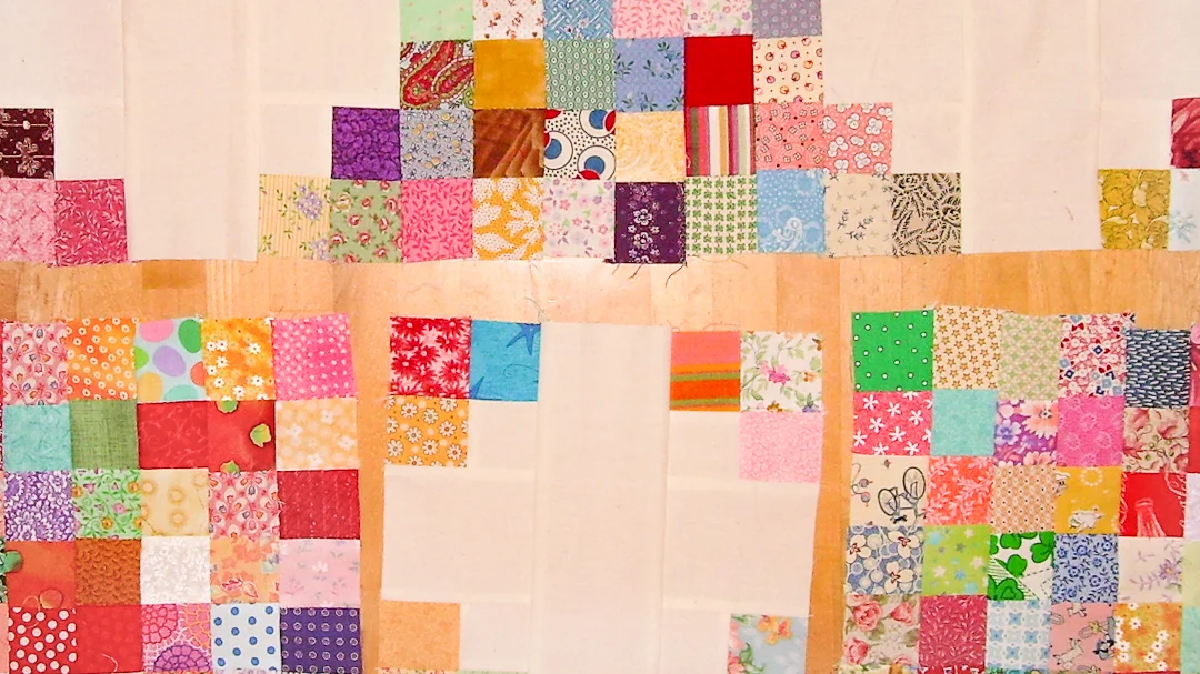 Bright Scrappy Triple Irish Chain via www.helloquilting.com