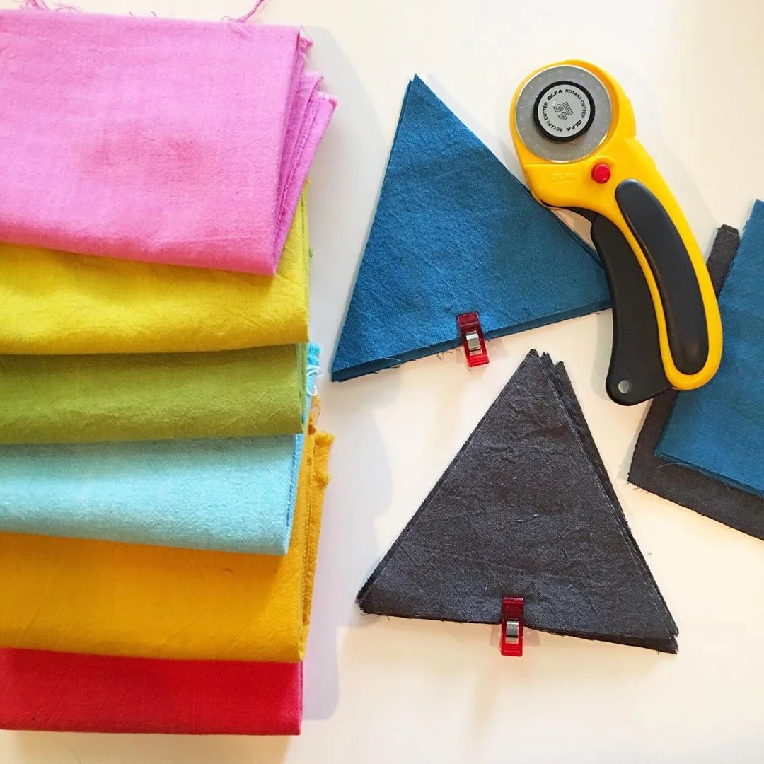Cutting Equilateral Triangles via www.helloquilting.com