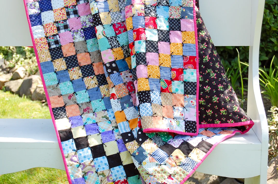 Antique-Inspired Scrappy Trip-Around-the-World Quilt via www.helloquilting.com