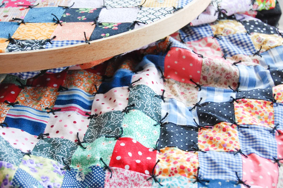 Antique-Inspired Scrappy Trip-Around-the-World Quilt via www.helloquilting.com