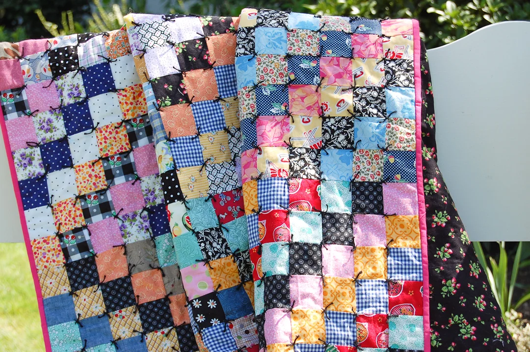 Antique-Inspired Scrappy Trip-Around-the-World Quilt Finished via www.helloquilting.com