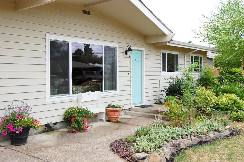 Pear Tree Cottage Tour Front Facade Currently via www.angelamaywaller.com