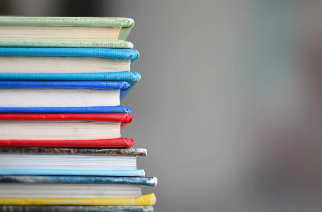 A Collection of Books by Kimberly Farmer on Unsplash via www.angelamaywaller.com