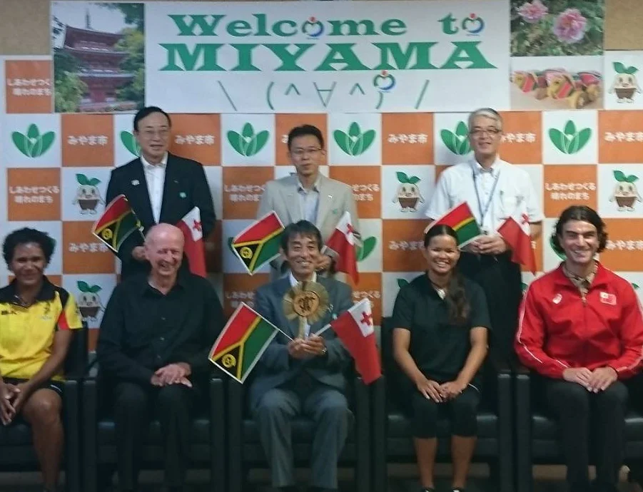 With Miyama City Mayor Morito Matsuhima (in the middle holding the flags and Tongan fan)