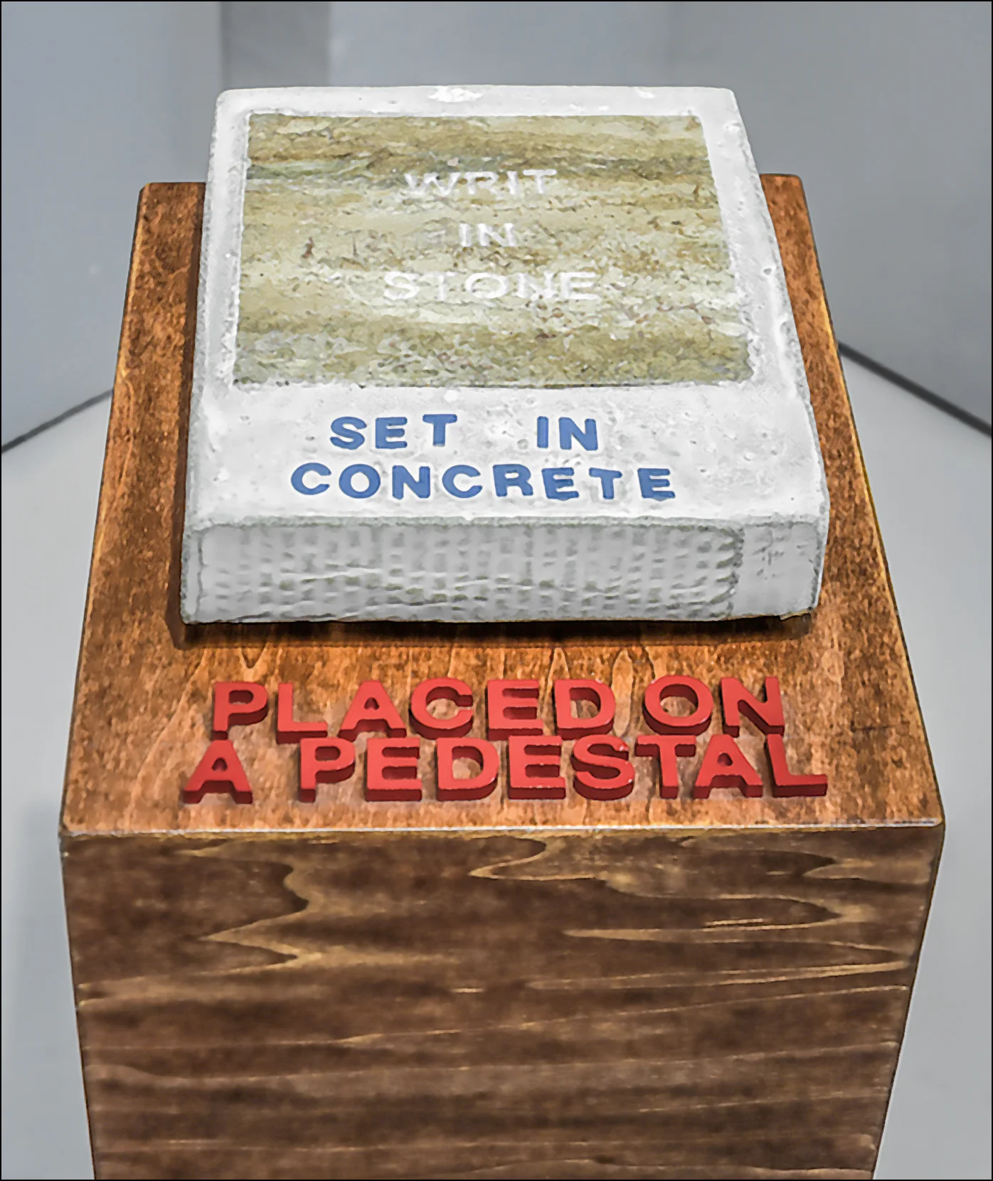 Writ in Stone, Set in Concrete, Placed on Pedestal