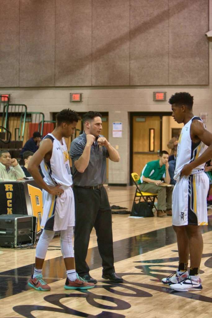 Coach Breslaw providing on-the-court instruction to his players. | Photo Credit: prephoops.com