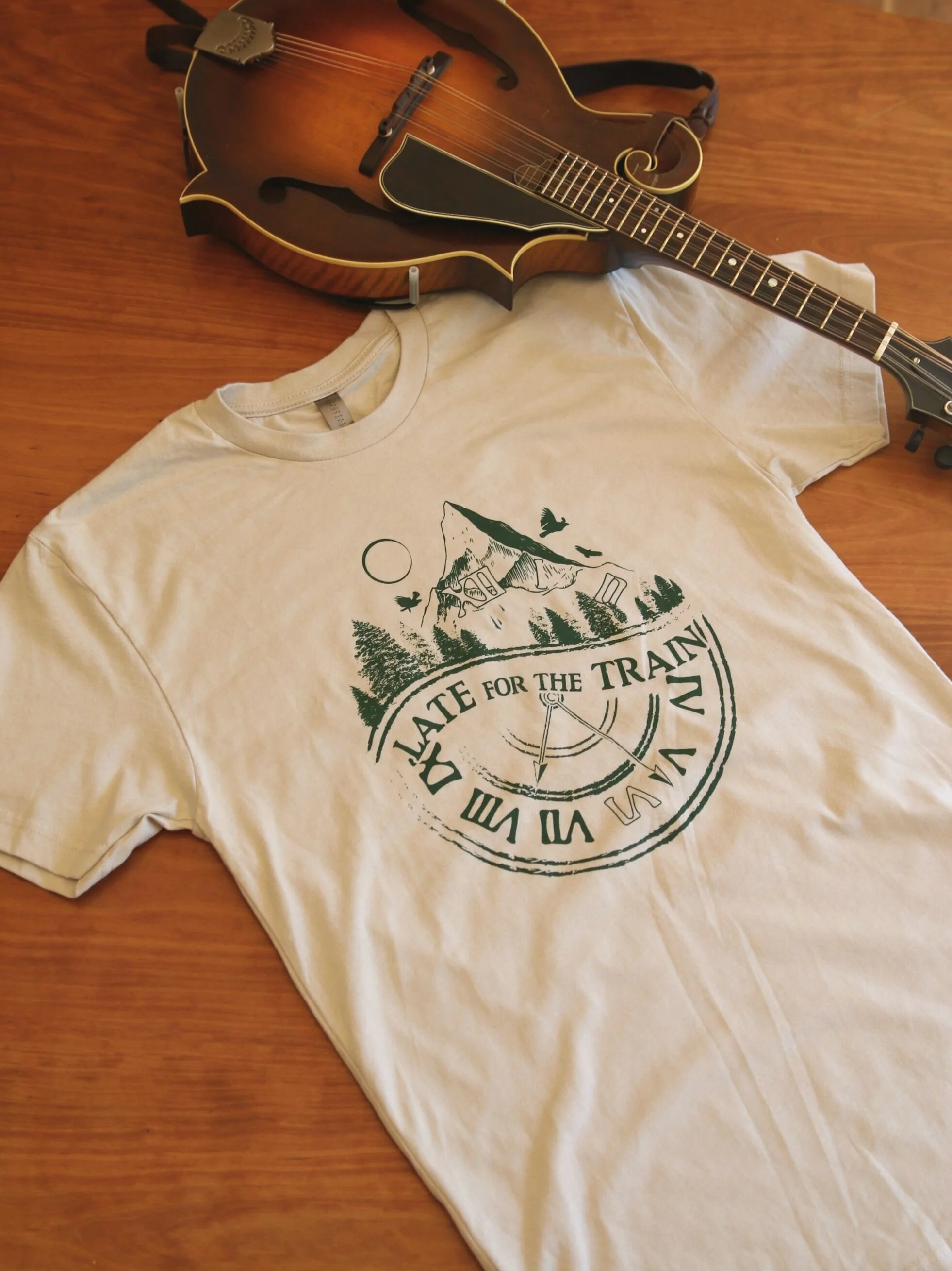 late-for-the-train-merch-tshirt-tan-green-mountain-unisex.jpg