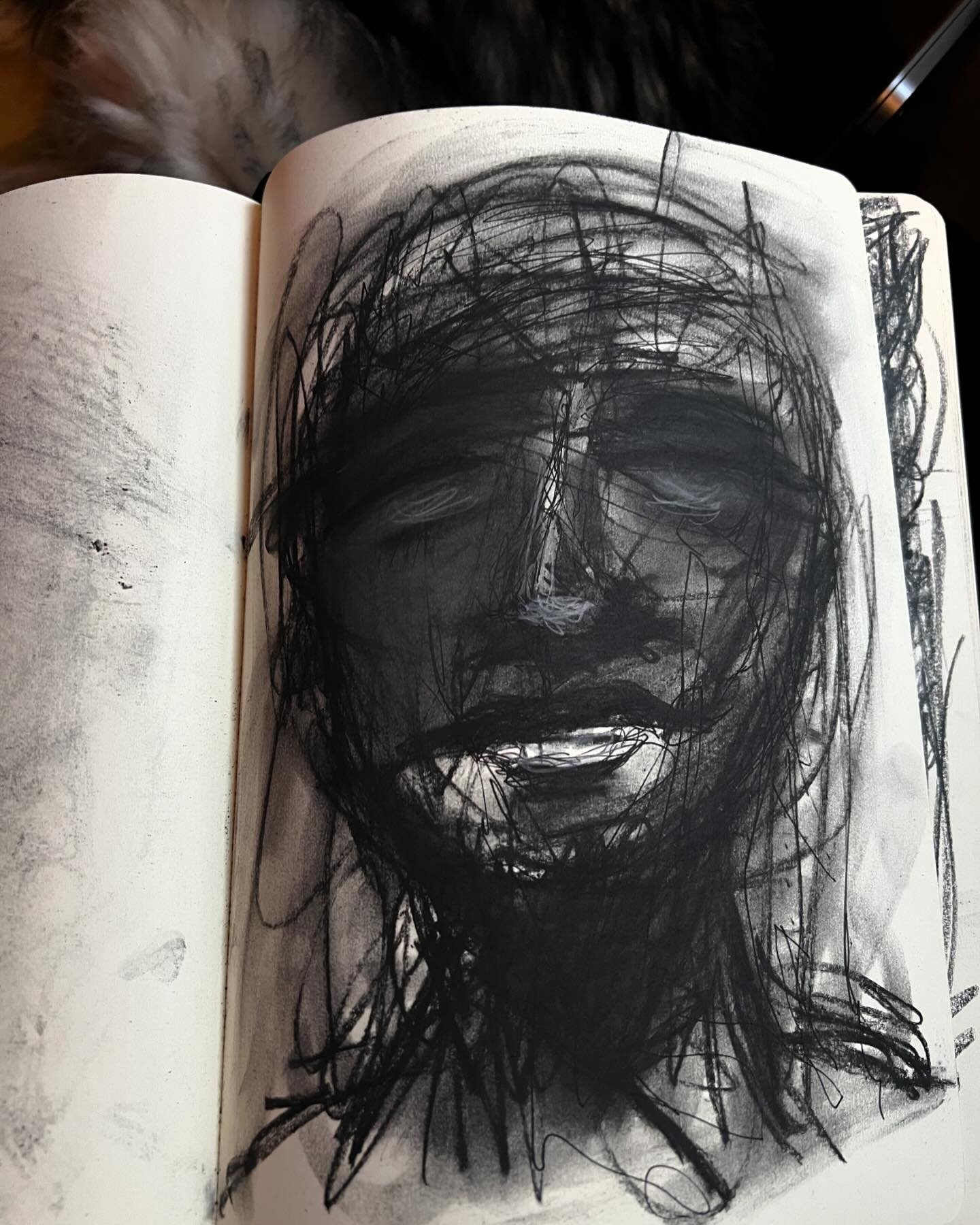 Faces made with charcoal