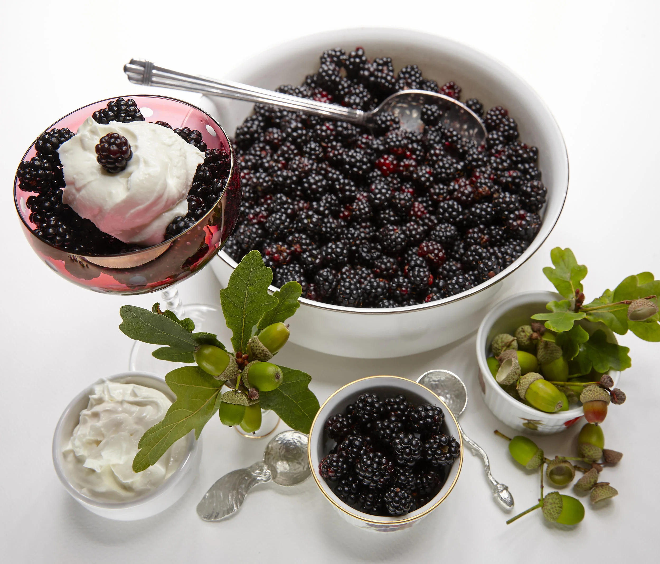 Wild Blackberries and yogurt, with acorn decorations. The acorns were blown down from our oak tree during the storms, a few days earlier.