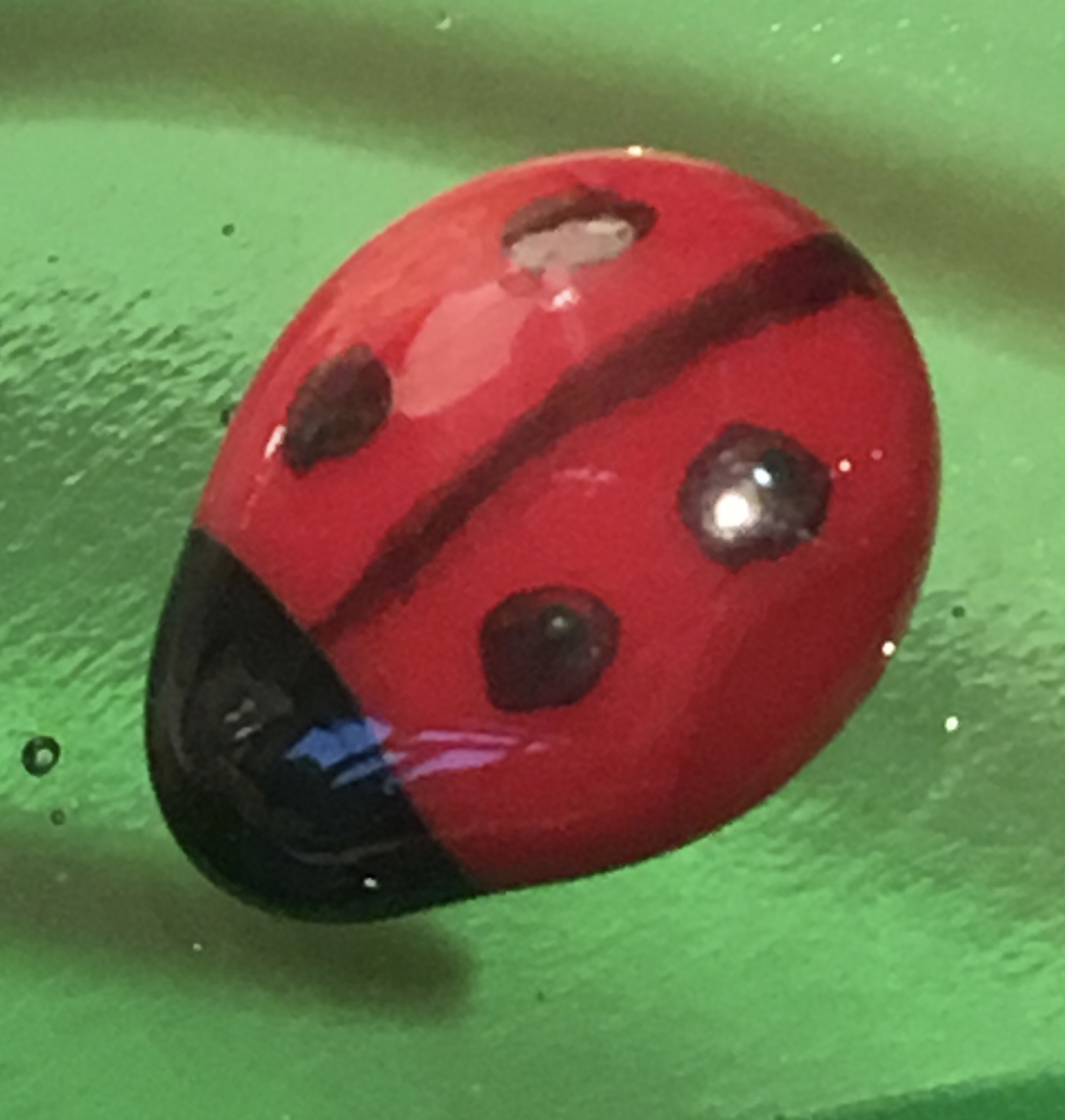 These little glass ladybirds started out as 3mm glass squares of red and black, which were melted into blobs and then put together again to melt into a whole. Quite fun!
