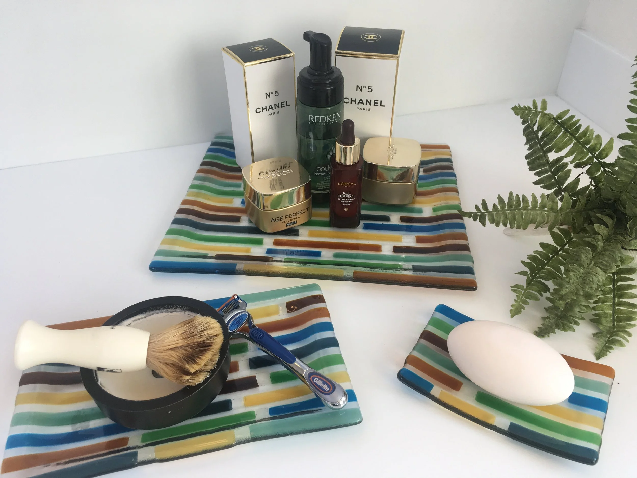 3 piece bathroom set in light blues, greens and amber