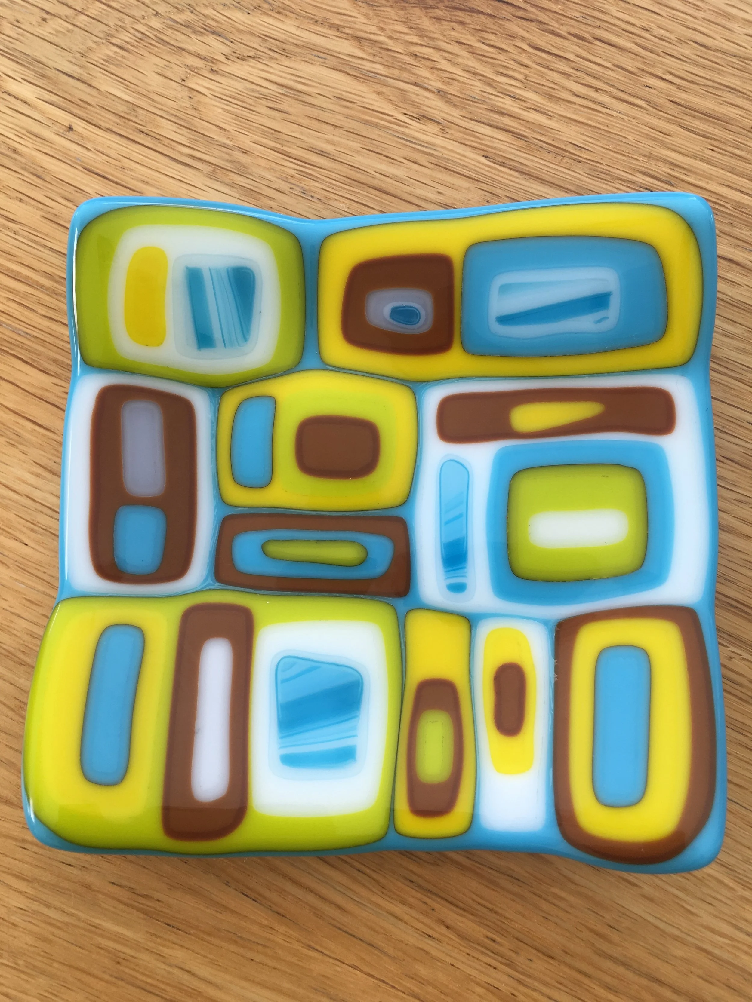 Geometrics small dish in yellow, brown and blues