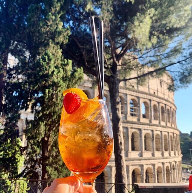 SPRITZ weather has taken hold in Rome. Today it was 31 degrees C (88 F) after 6:00 PM! ✨🍹✨ #aperolspritz #colosseo #roma