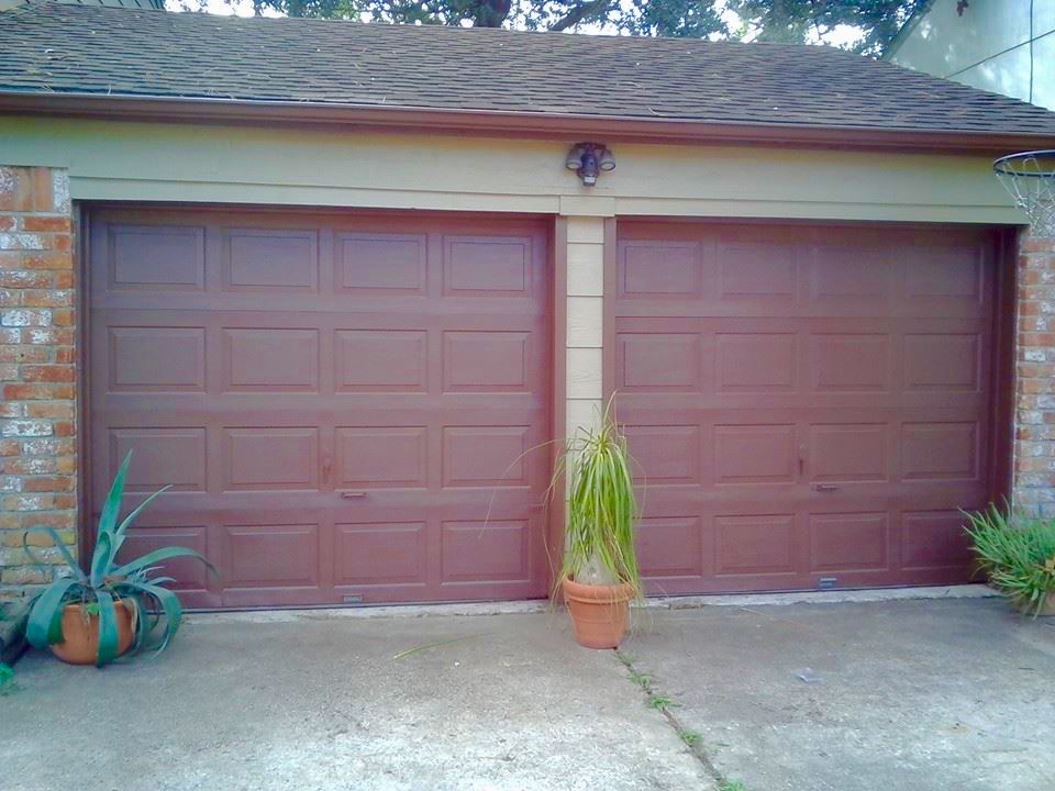 installed garage doors and painting.jpg