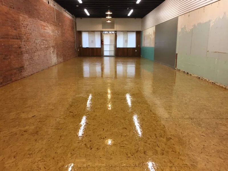 Before - OSB Floors and Hidden Clerestory at Storefront