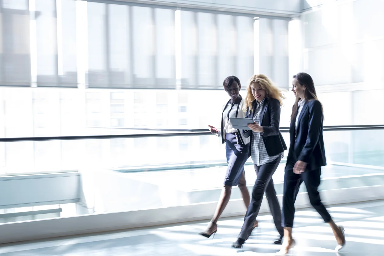Business-women-walking-in-a-hall-659285520_1257x837.jpeg