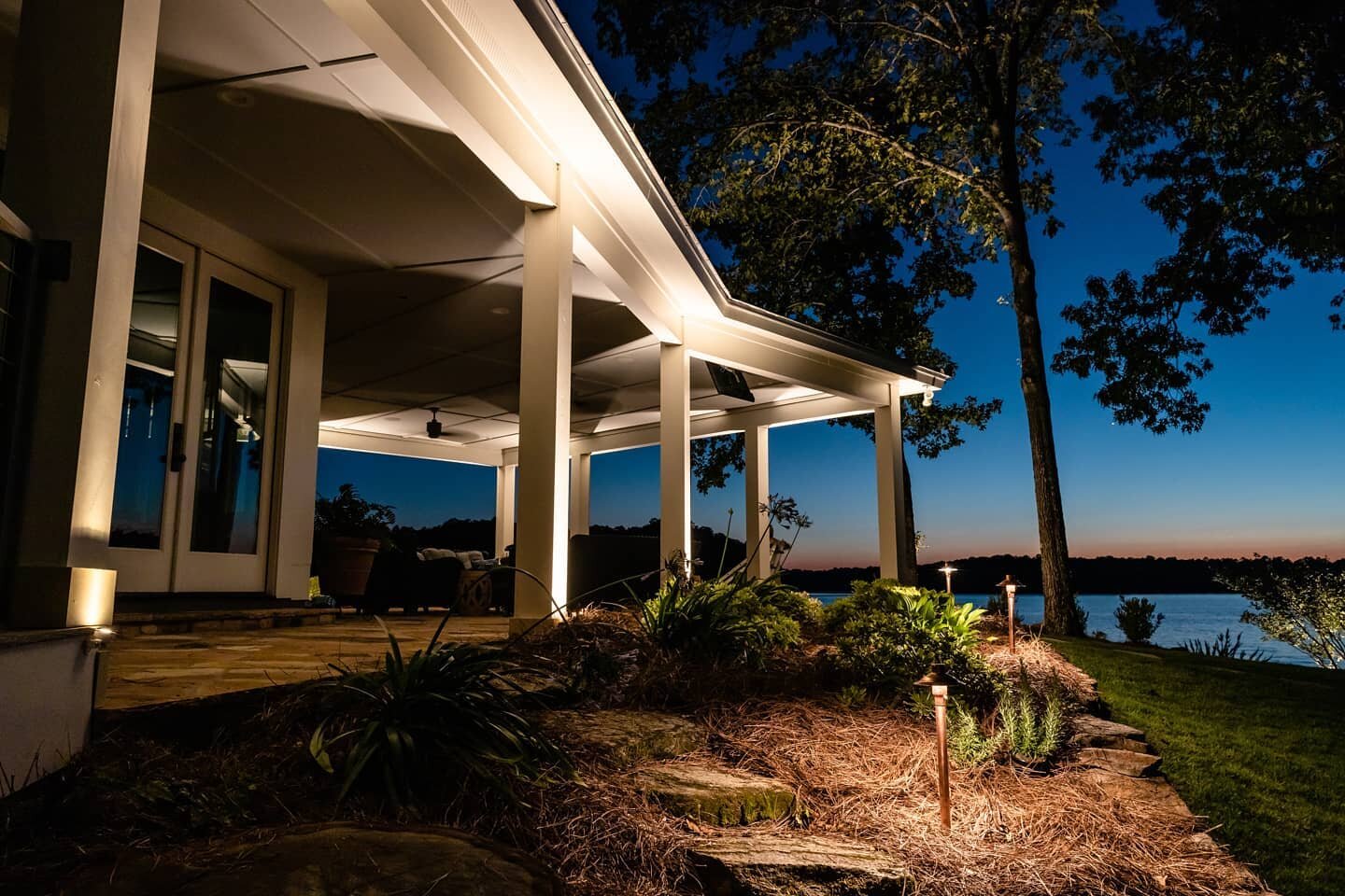 Returning to this Lake House project in the evening for photos was a great experience! It's hard to beat sunsets at the lake, but we might argue that dusk on the water, surrounded by the glow of beautiful landscape lighting, is a pretty close second.